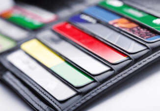 Research: The advantages of having credit cards in your wallet - Credit-Land.com