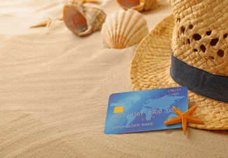 Research: Advantages and disadvantages of traveling with credit cards - Credit-Land.com