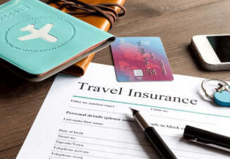 Research: Travel insurance limitations of credit cards - Credit-Land.com